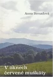 V oknech červené muškáty